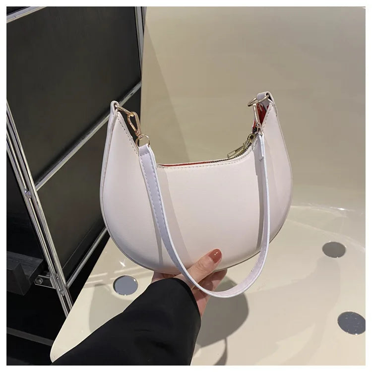 Arcelle Half-Moon Shoulder Bag — White 1