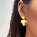 Sculptura Statement Earrings — Gold Heart Drops