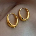 Sculptura Statement Earrings — Chunky Oval Hoops