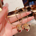 Sculptura Statement Earrings — Heart Charm Hoops