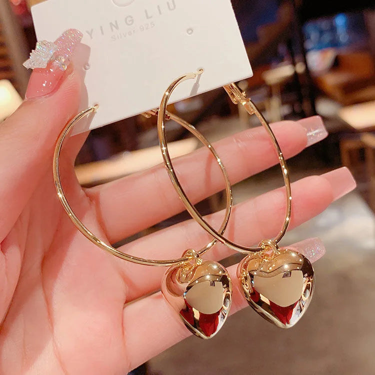 Sculptura Statement Earrings — Heart Charm Hoops