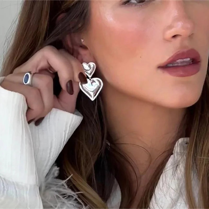 Sculptura Statement Earrings — Silver Heart Drops